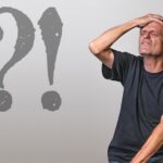 Immagine di un documento legale con il titolo "Legge 104" e un punto interrogativo in evidenza.